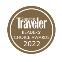 'Conde Nast Traveler Readers' Choice Awards 2023' displayed on a brown poster in white.