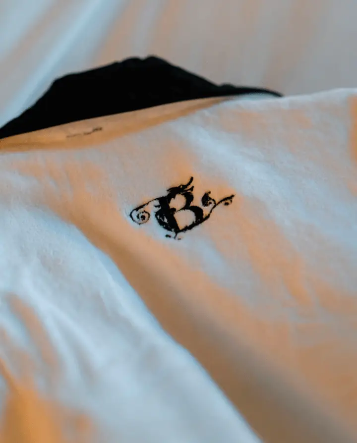 The logo of The Beekman Hotel printed on the towel