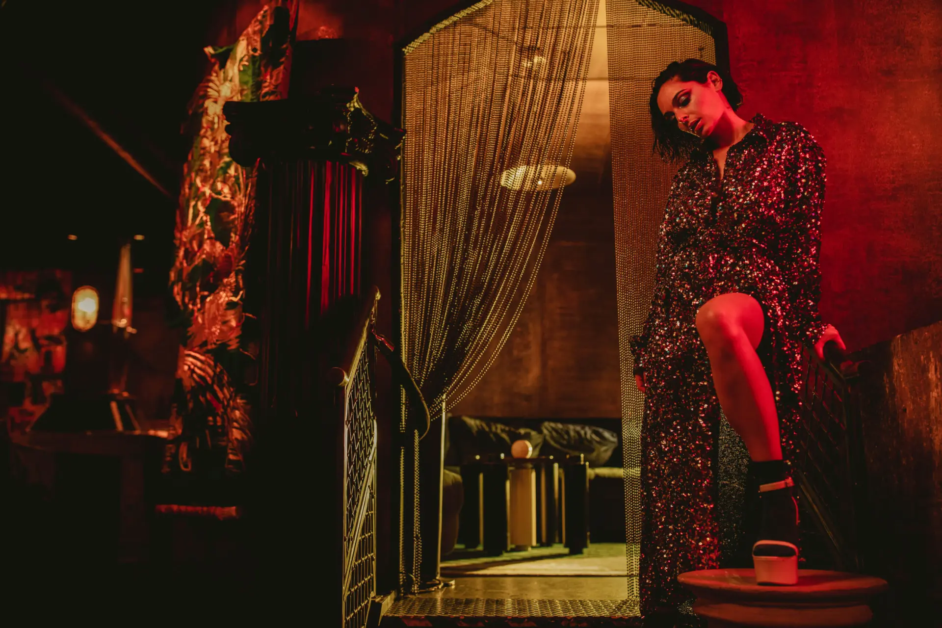 A woman at the Tribeca Film Festival in Manhattan, enjoying the event's vibrant atmosphere and celebrating cinematic excellence.